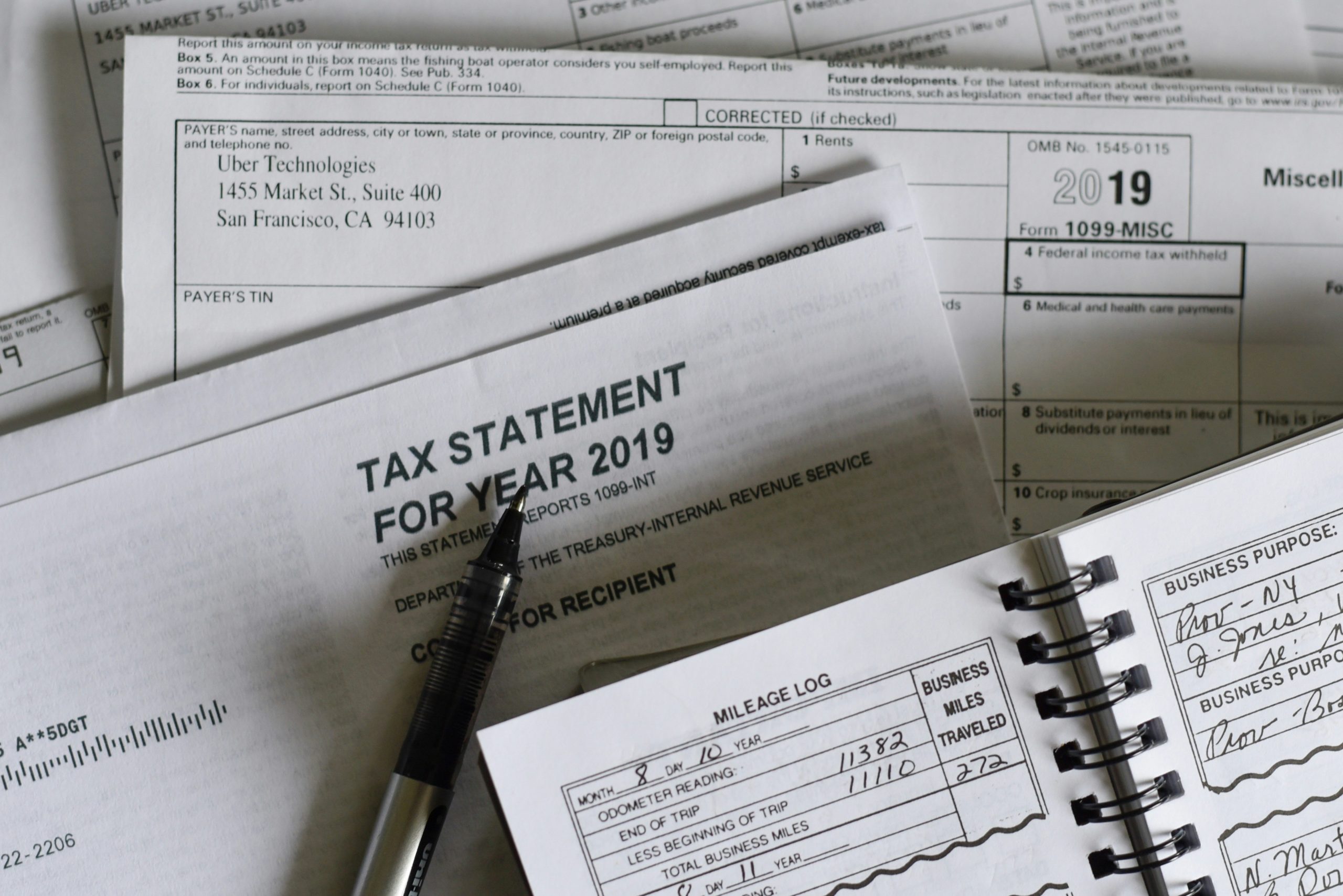 A close-up of various tax documents, including a tax exemption certificate.